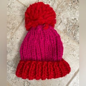 American Eagle pom-pom beanie. Two tone, red and vibrant pink. Brand new!